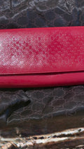 Gucci large red clutch