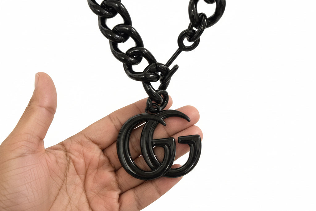 Gucci black belt/chain